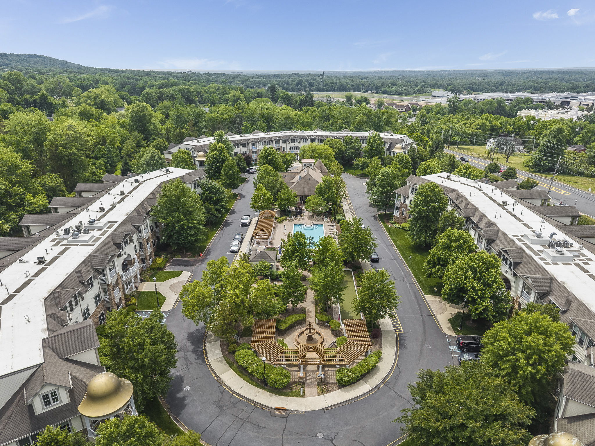 Aerial View-	Residents enjoy an exceptional lifestyle with access to a library, clubhouse, outdoor pool, hot tub, fitness center, and bocce courts.