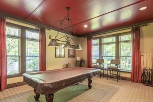 Clubhouse Billiards Room-	Residents enjoy an exceptional lifestyle with access to a library, clubhouse, outdoor pool, hot tub, fitness center, and bocce courts.