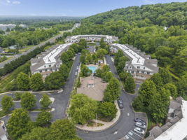 Aerial View-	Residents enjoy an exceptional lifestyle with access to a library, clubhouse, outdoor pool, hot tub, fitness center, and bocce courts.