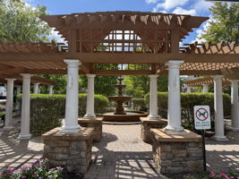 Zen Gardens-The meticulously maintained grounds, with colorful Zen-like gardens and a tranquil waterfall fountain creates a peaceful setting for relaxation and socializing.