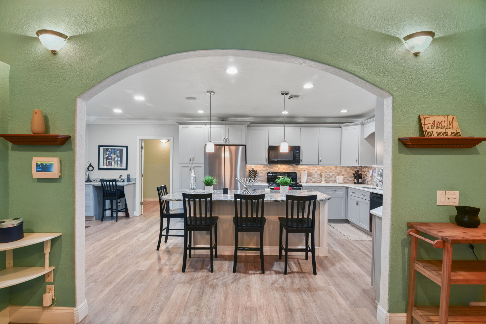 Beautifully appointed kitchen open to the living room