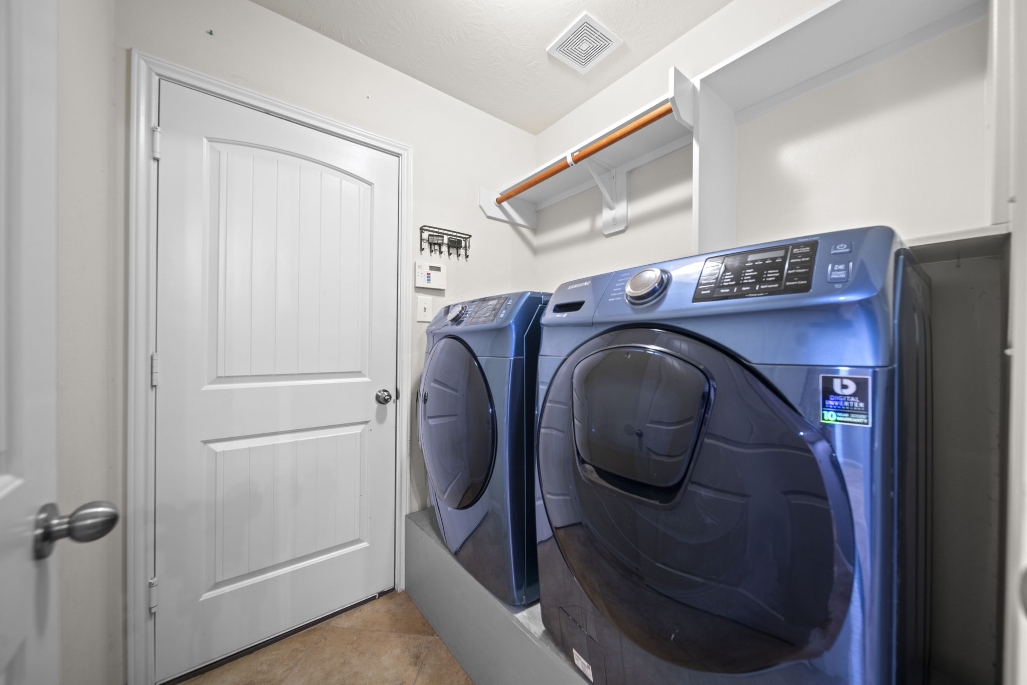 Laundry room with shelves!