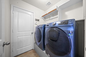 Laundry room with shelves!