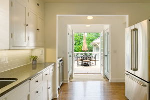 French Doors lead to rear Grilling & Dining Deck