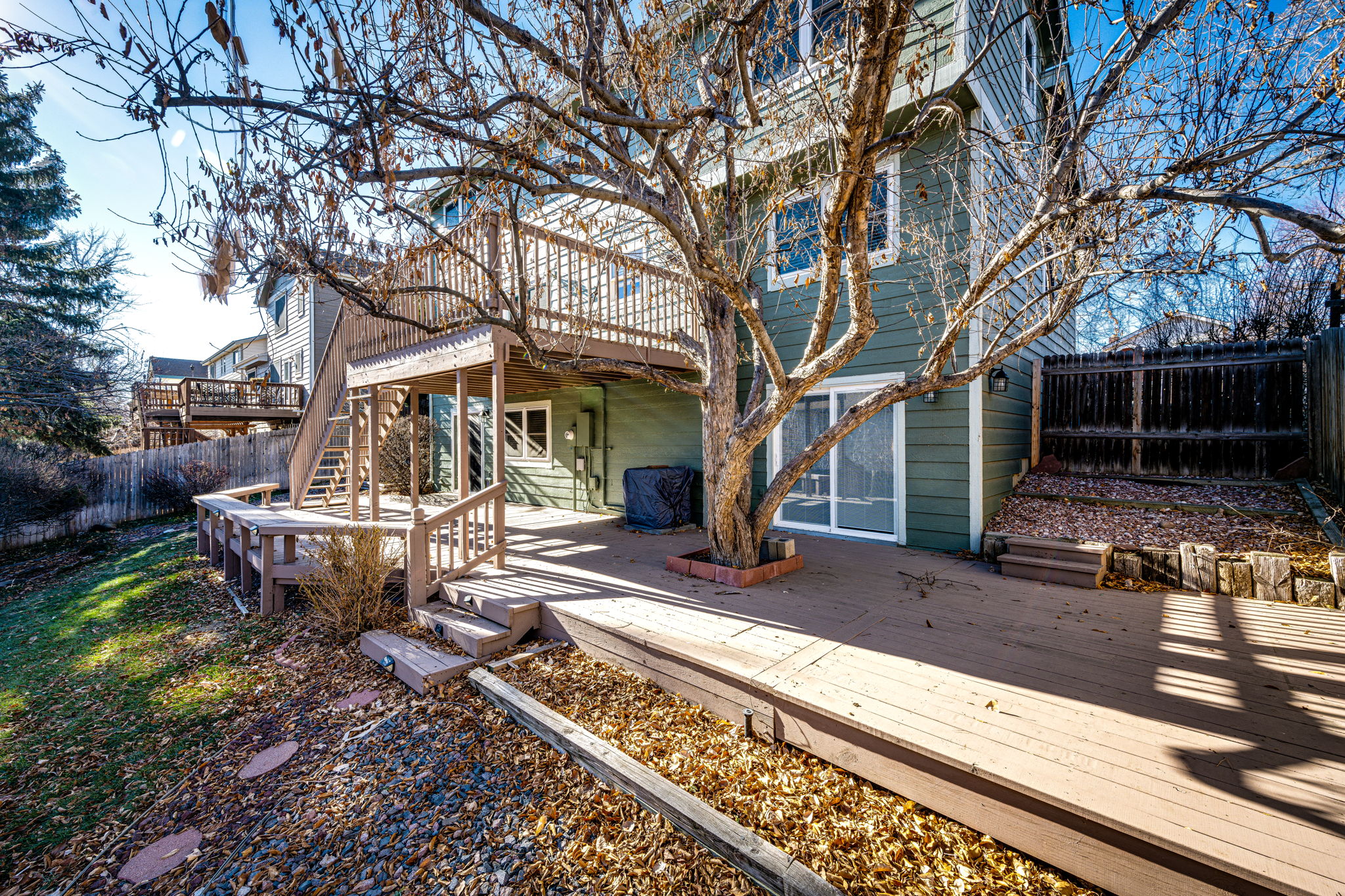 Backyard w Mature Trees & Expansive Decks