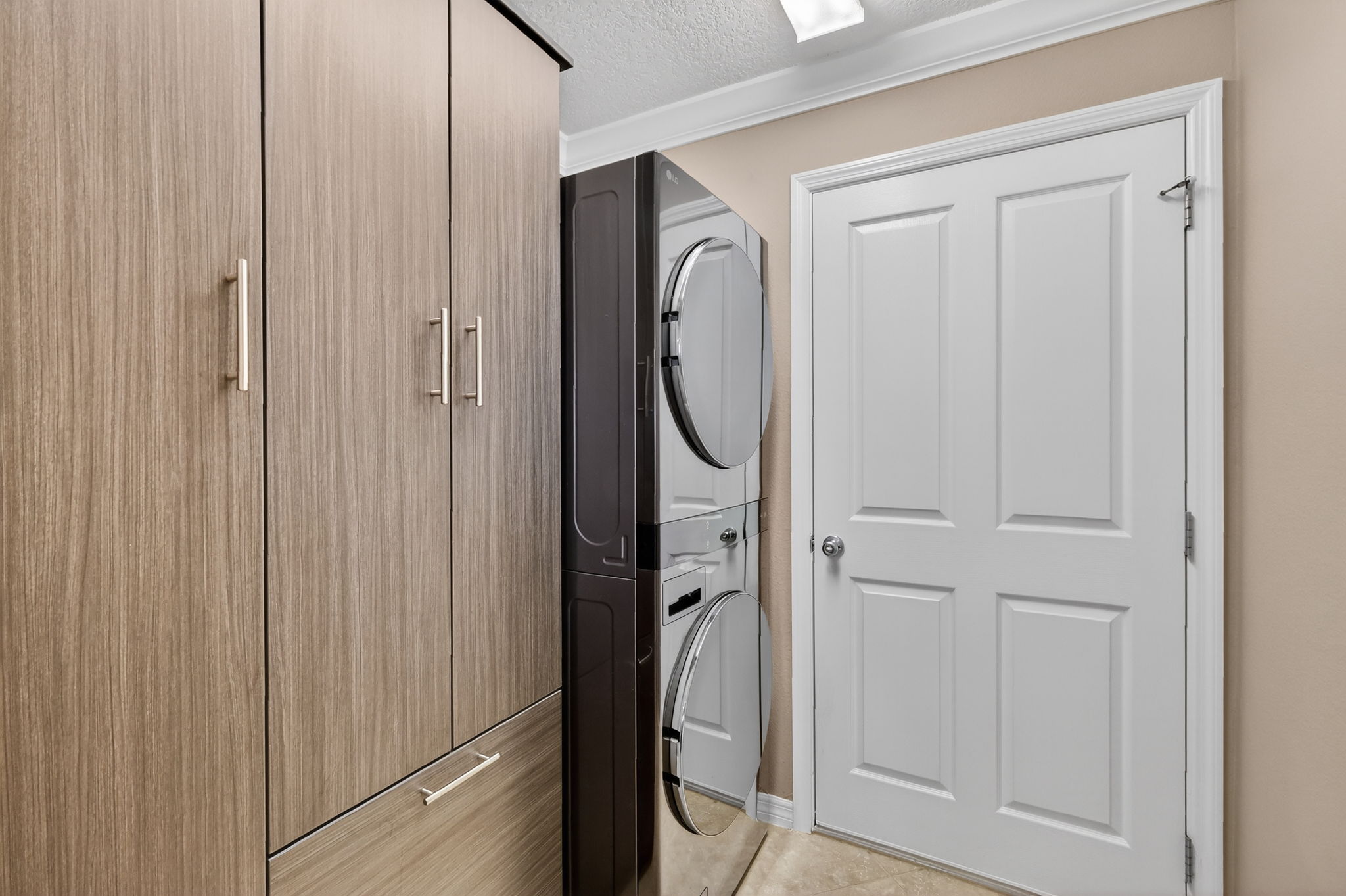 Interior Laundry with Custom Cabinetry