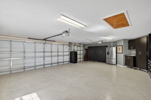 Expansive 32'x23' Garage with Custom Cabinetry