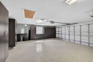 Expansive 32'x23' Garage with Custom Cabinetry