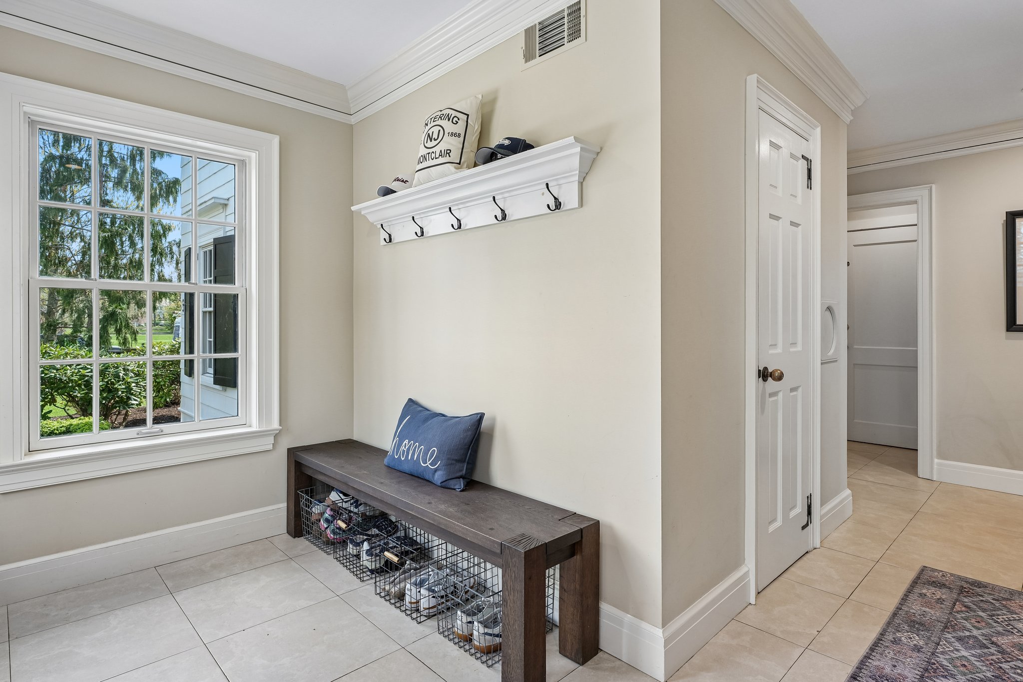 World's most welcoming mudroom with room for all the things.