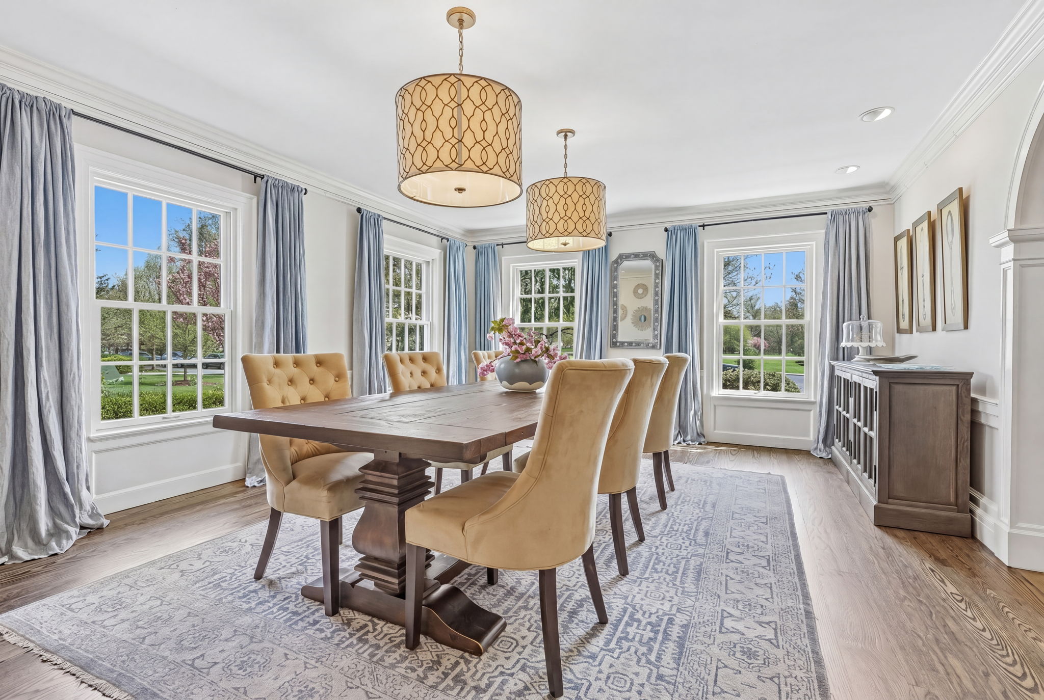 A dining room designed for candlelight, celebrations, and second helpings - all with views to the park across the street