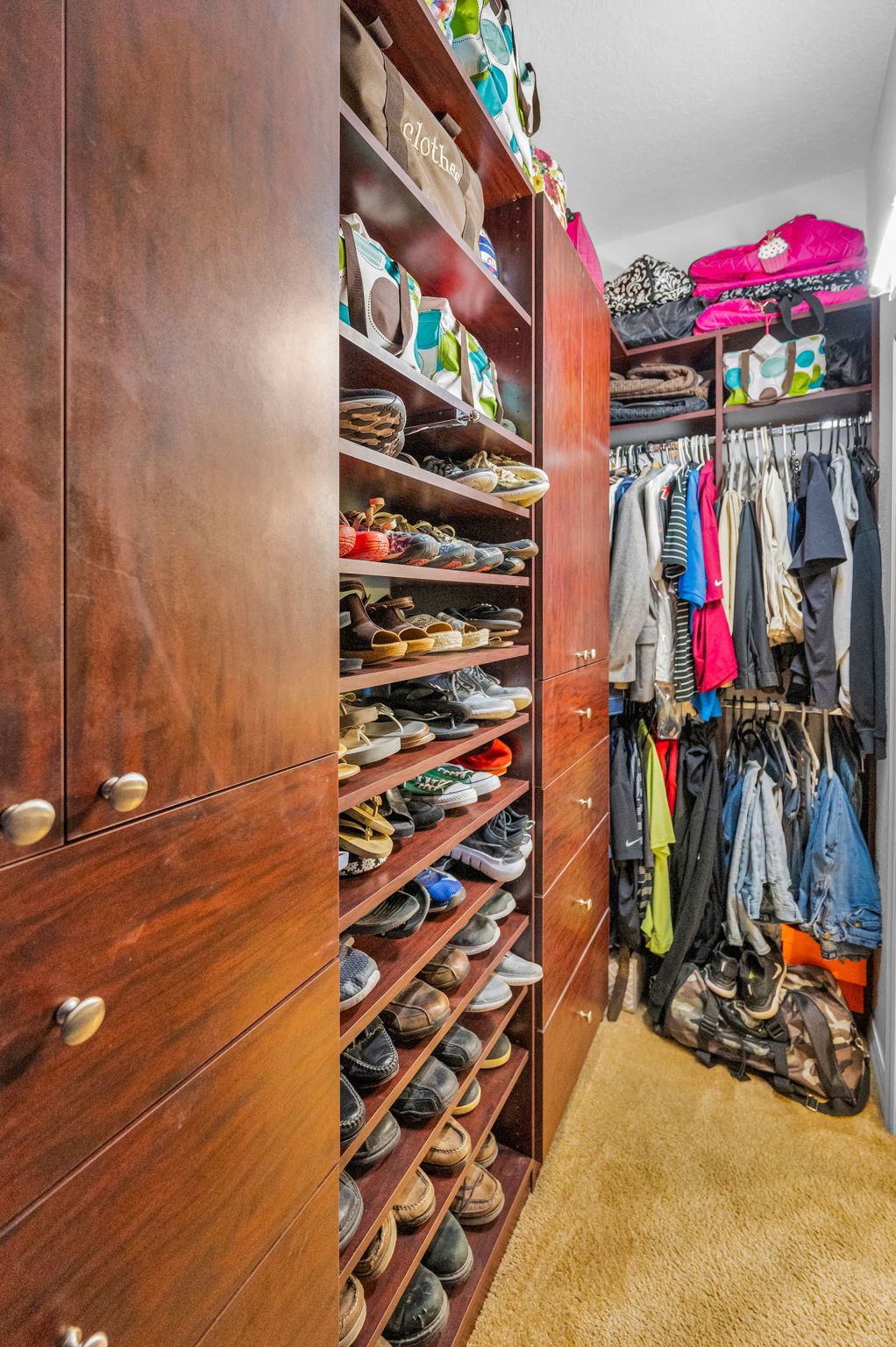 First Floor Primary Bedroom Walk-in Closet1b