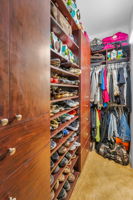 First Floor Primary Bedroom Walk-in Closet1b
