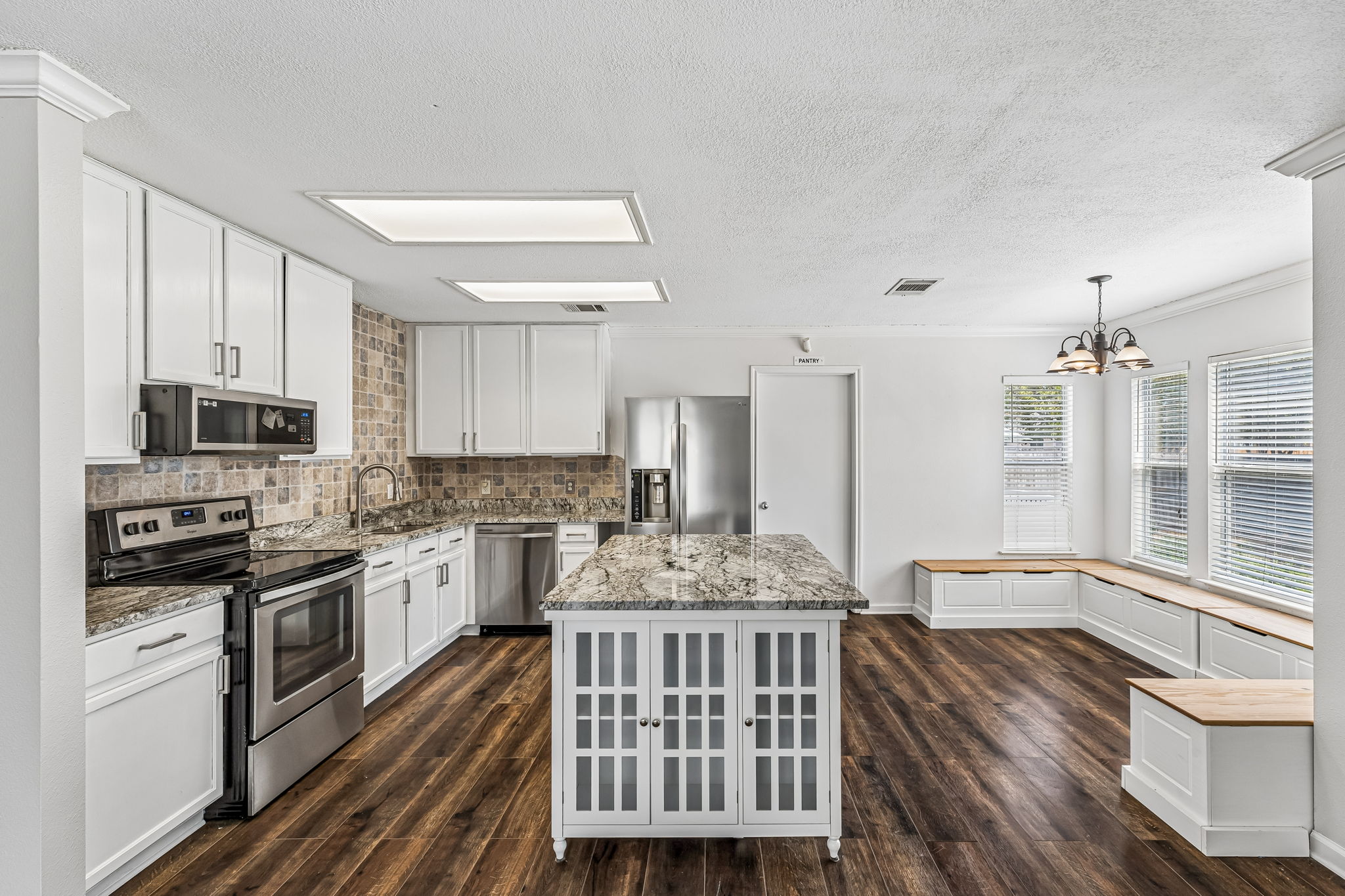 Eat-in kitchen with built-in banquet.