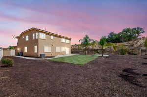 43-36312 Shedera Ct day to dusk.jpeg