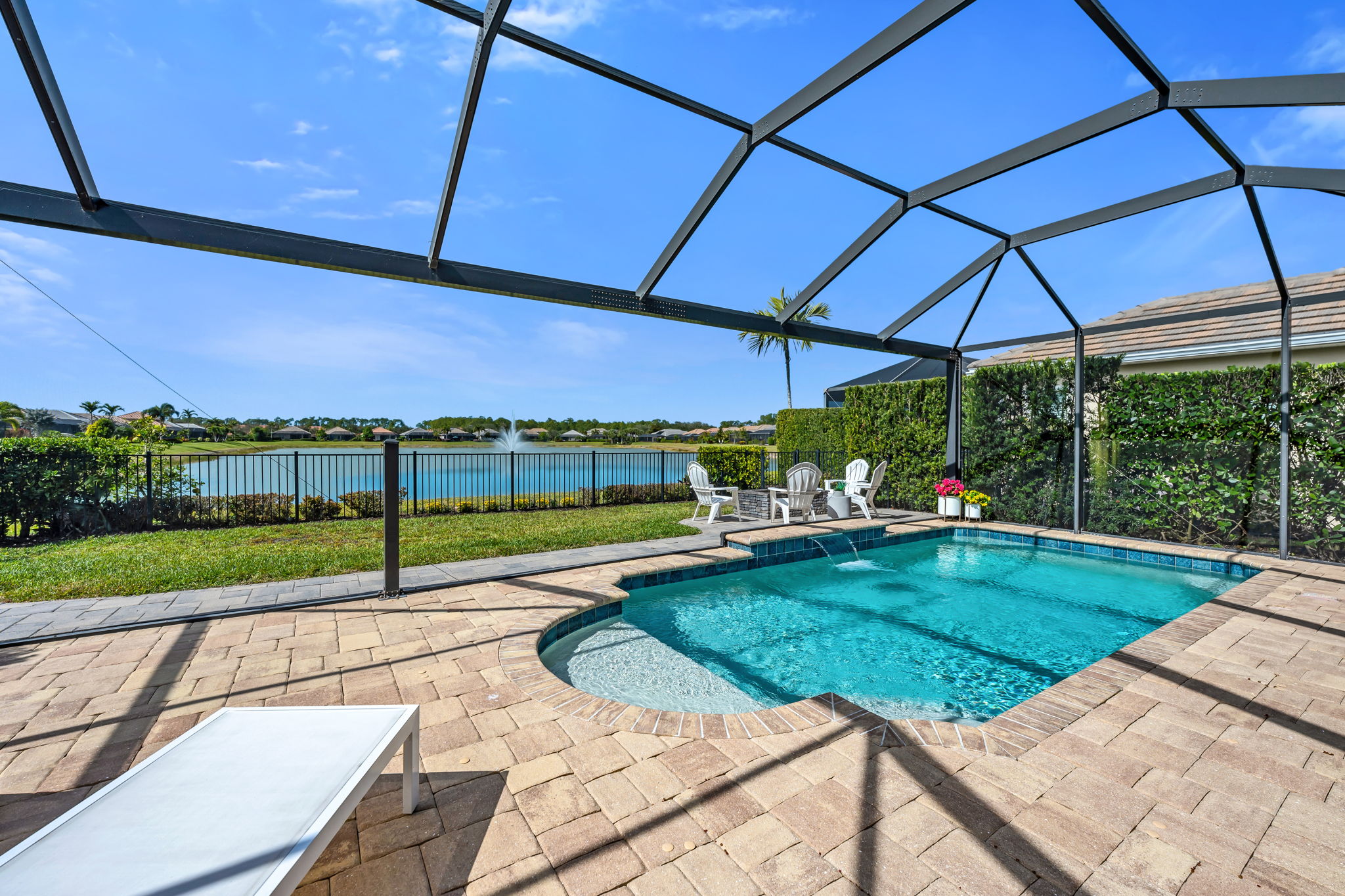 Swimming Pool with Picture Window Screen, Fire Pit and Long Lake View.