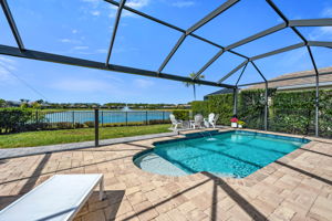 Swimming Pool with Picture Window Screen, Fire Pit and Long Lake View.