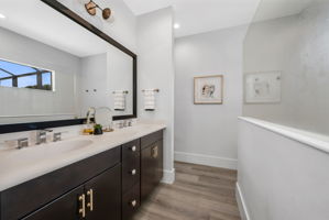 Primary Bathroom with Double Sink Vanity and Walk-In Shower