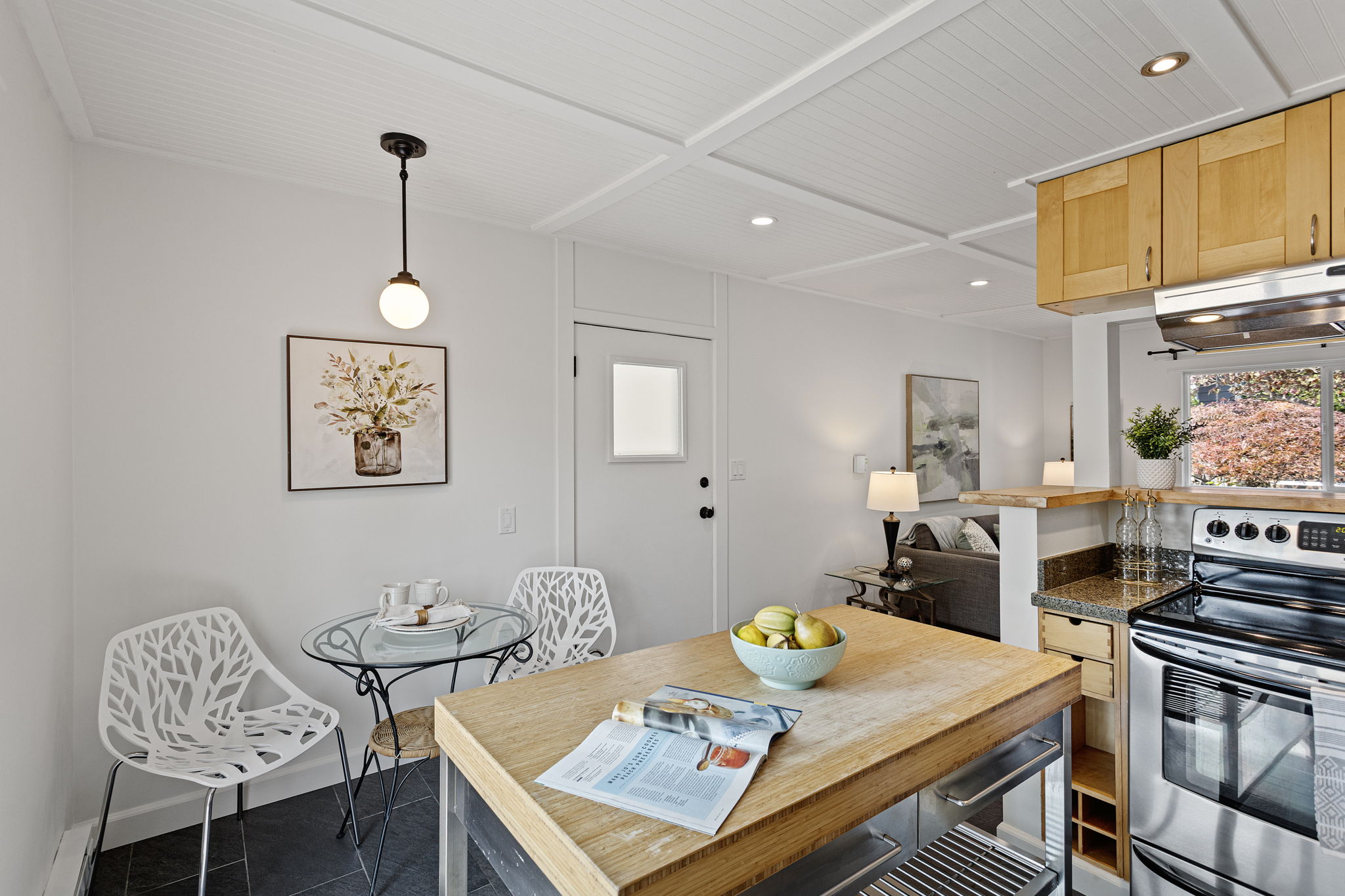 This is the practical everyday entrance: straight in from the carport, with the separate laundry and storage room just outside the door.