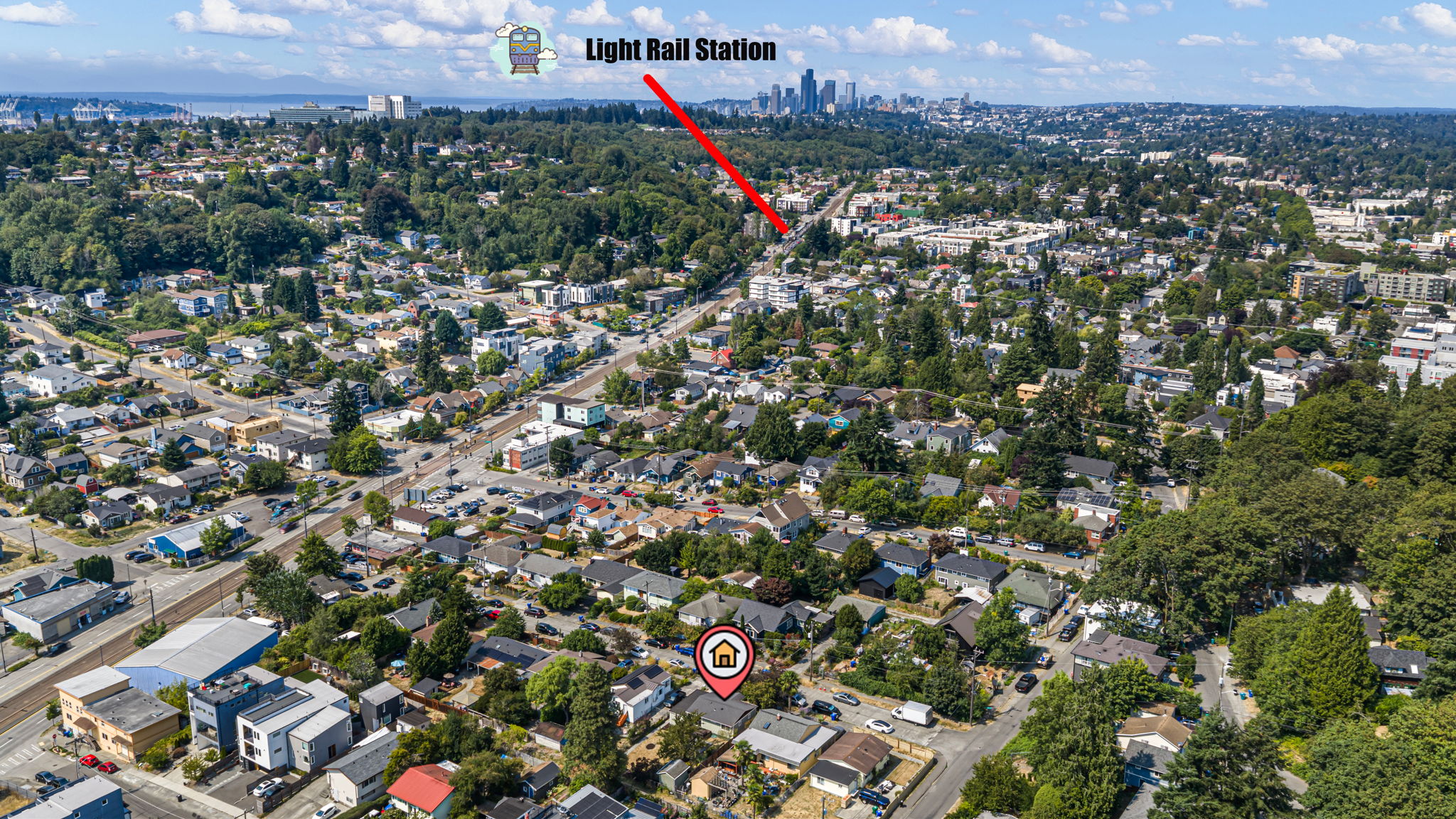 About six blocks to Columbia City Station—with downtown Seattle and Elliott Bay beyond. The planned Graham Street Station would be even closer. Small-house ownership, connected to a much bigger city.