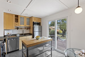 For a house this size, the kitchen does real work: substantial cabinetry and counter space, full-size appliances, and storage that doesn’t feel like an afterthought.