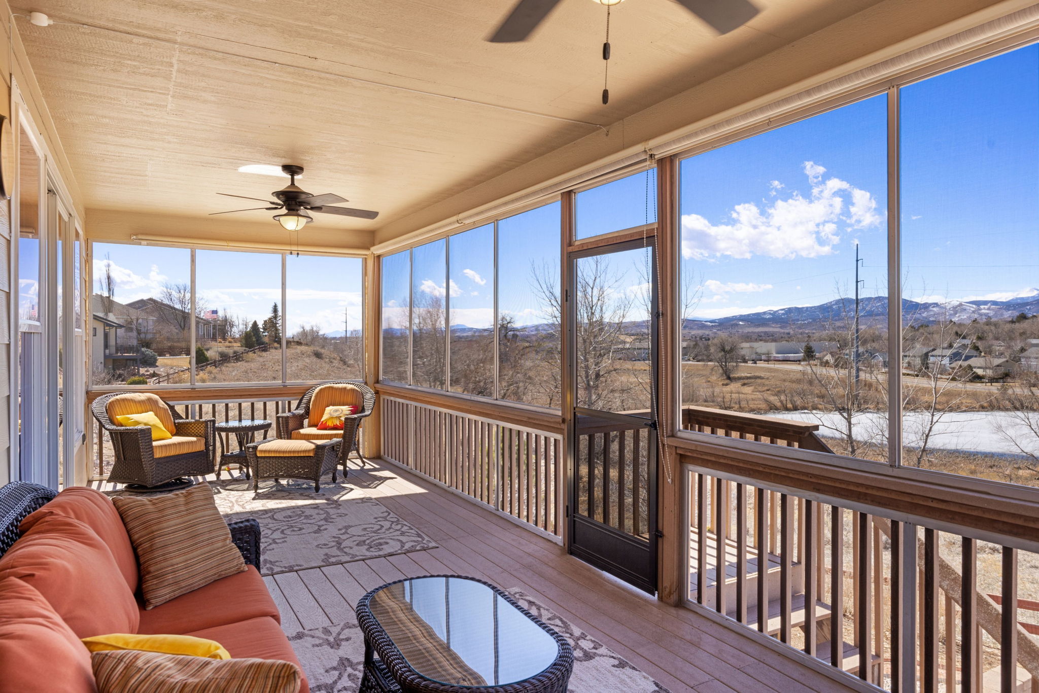 Enclosed deck overlooking meadow and pond