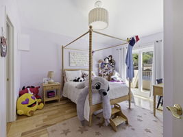 Bedroom 4 with access to east facing balcony