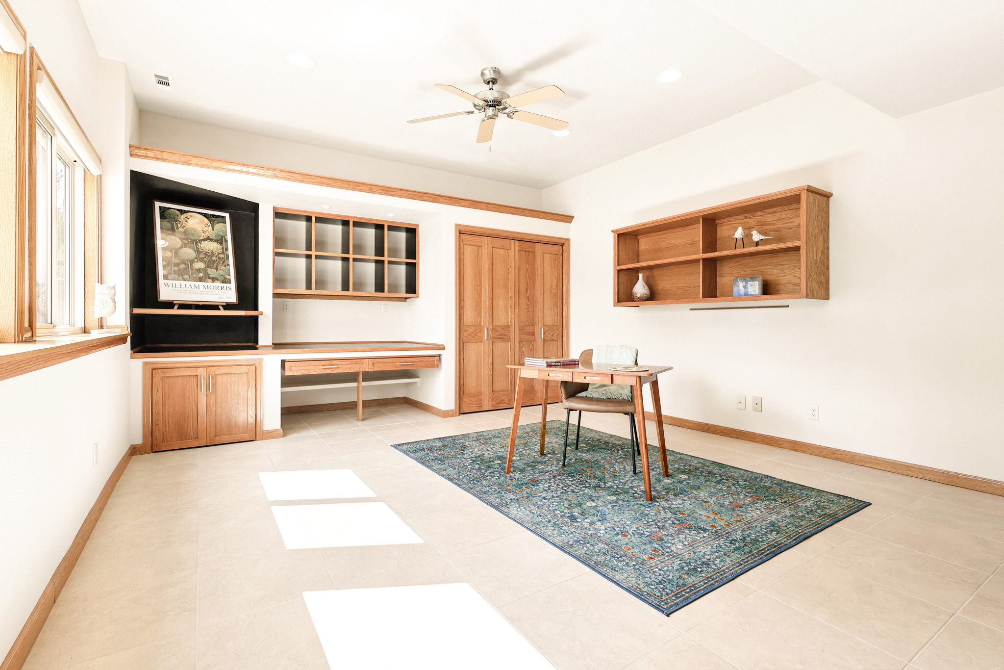 Office/studio showcases storage and built-ins.