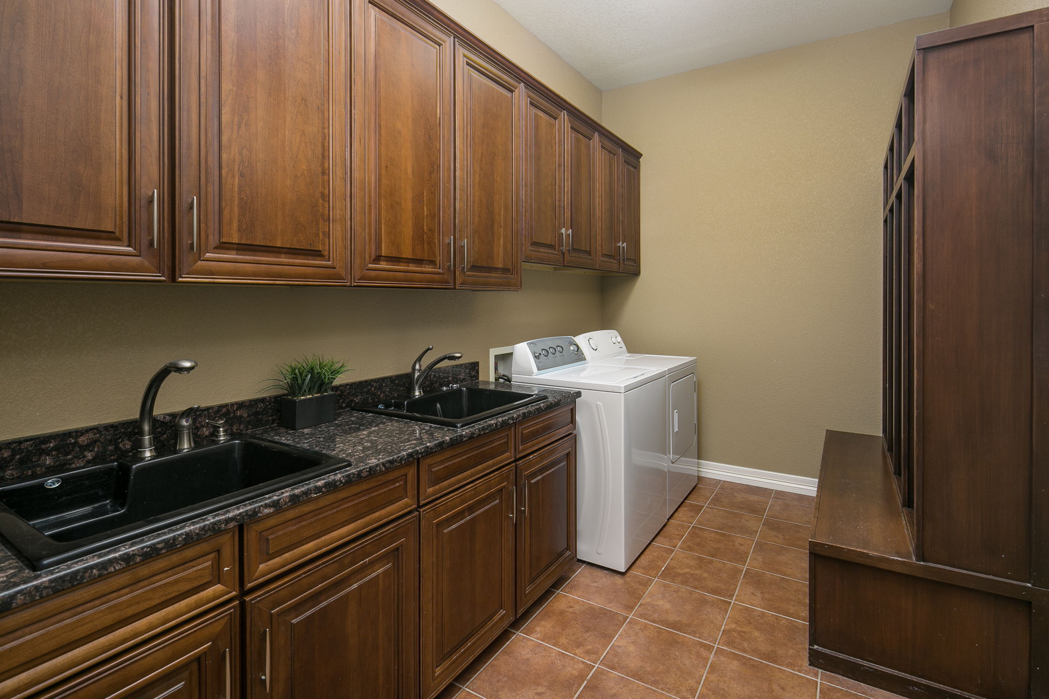Main Level Laundry Features Dual Sinks and Tons of Storage