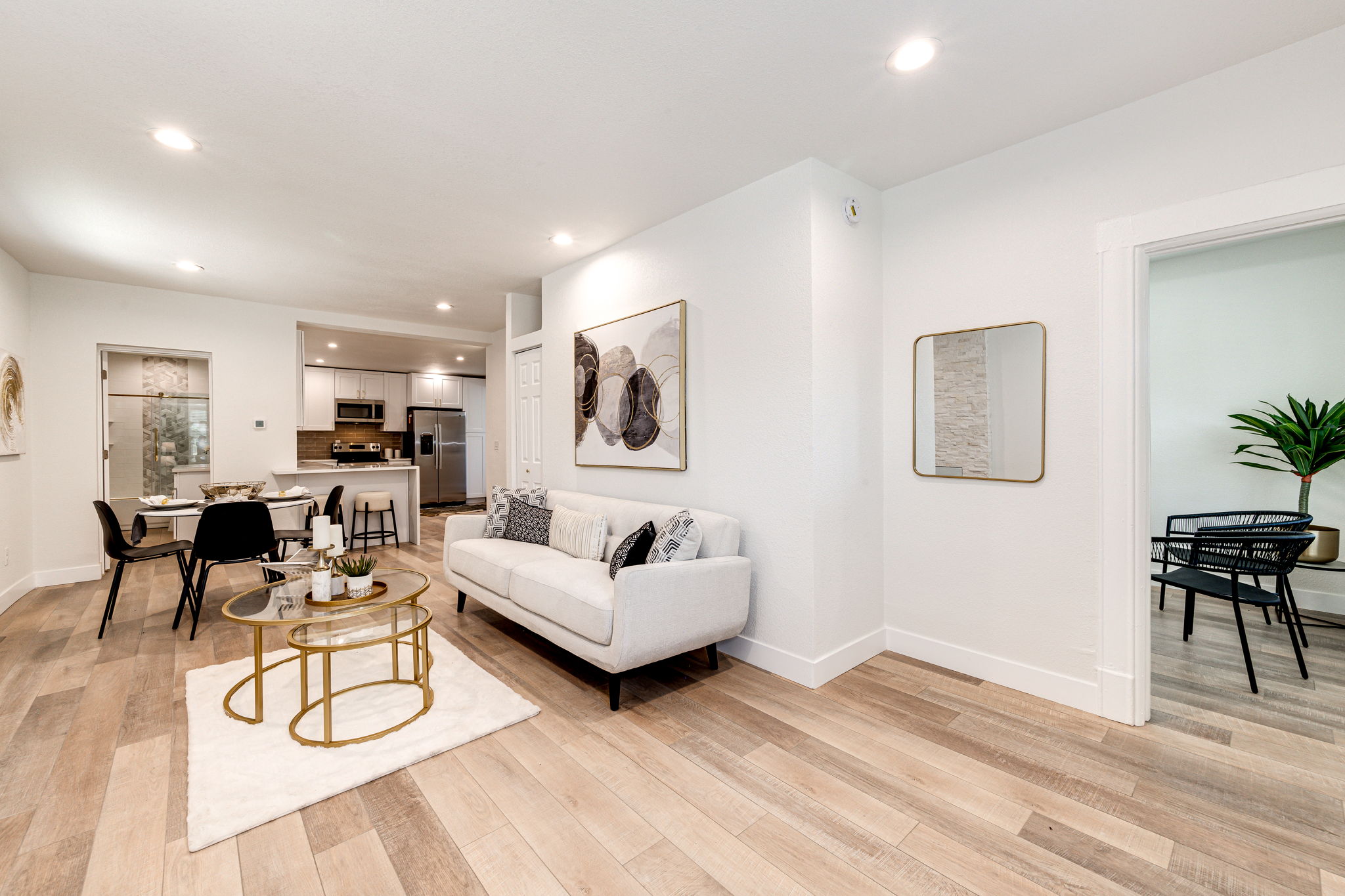 Spacious Living Room Flowing to Dining & Kitchen