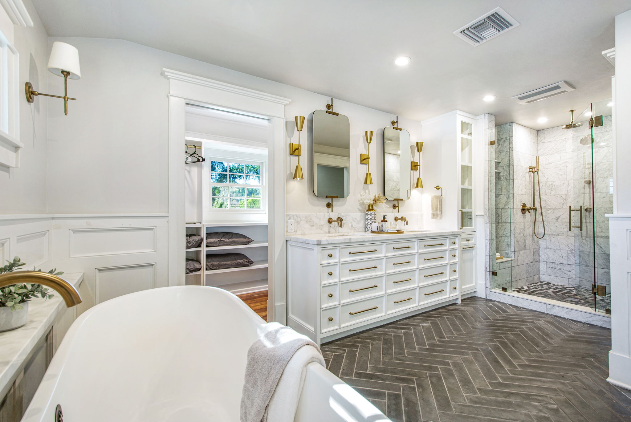 Luxurious primary suite spa-bath w/high end appointments