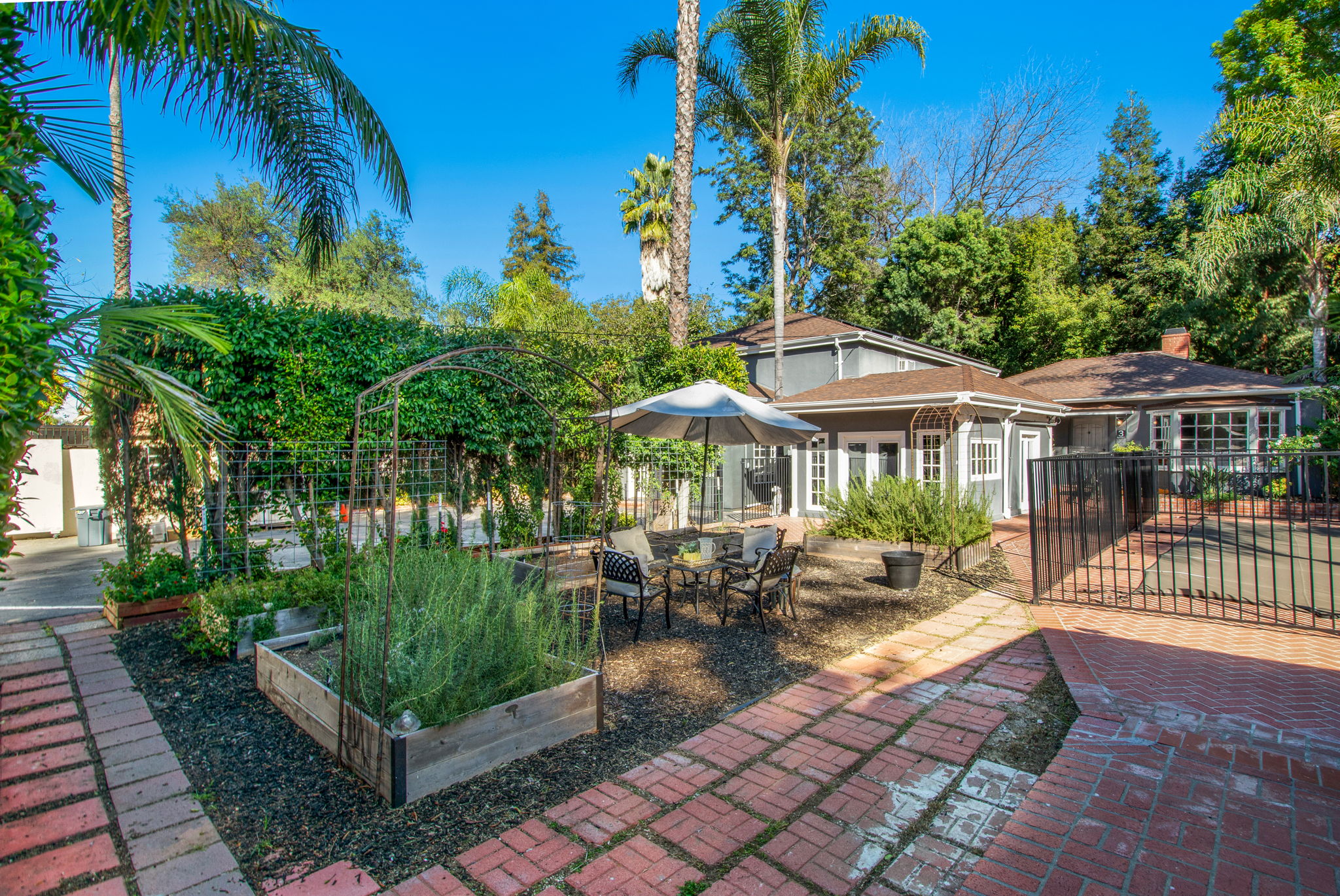 third garden w/raised garden boxes, irrigation and sitting area