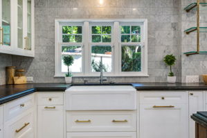 Kitchen w/Farm sink and custom cabinets