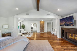 Vaulted ceilings & fireplace in primary suite