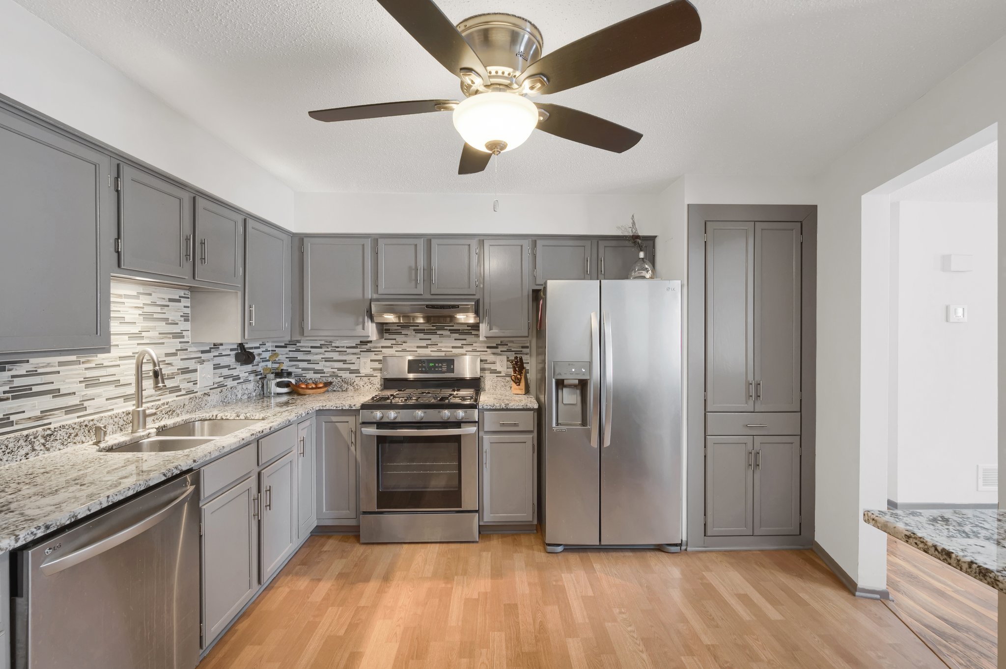 The cabinets feature a custom cabinet storage system!
