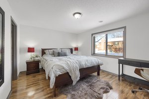 Spacious primary bedroom with ample natural light.