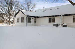 The home also features a back patio that offers a scenic view of the pond.