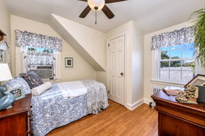 Bedroom 3: Bright and Charming with Hardwood Floors.