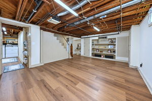 Lower Level – Flexible Space for Exercise, Hobbies, Recreation & More, with Laundry Room.