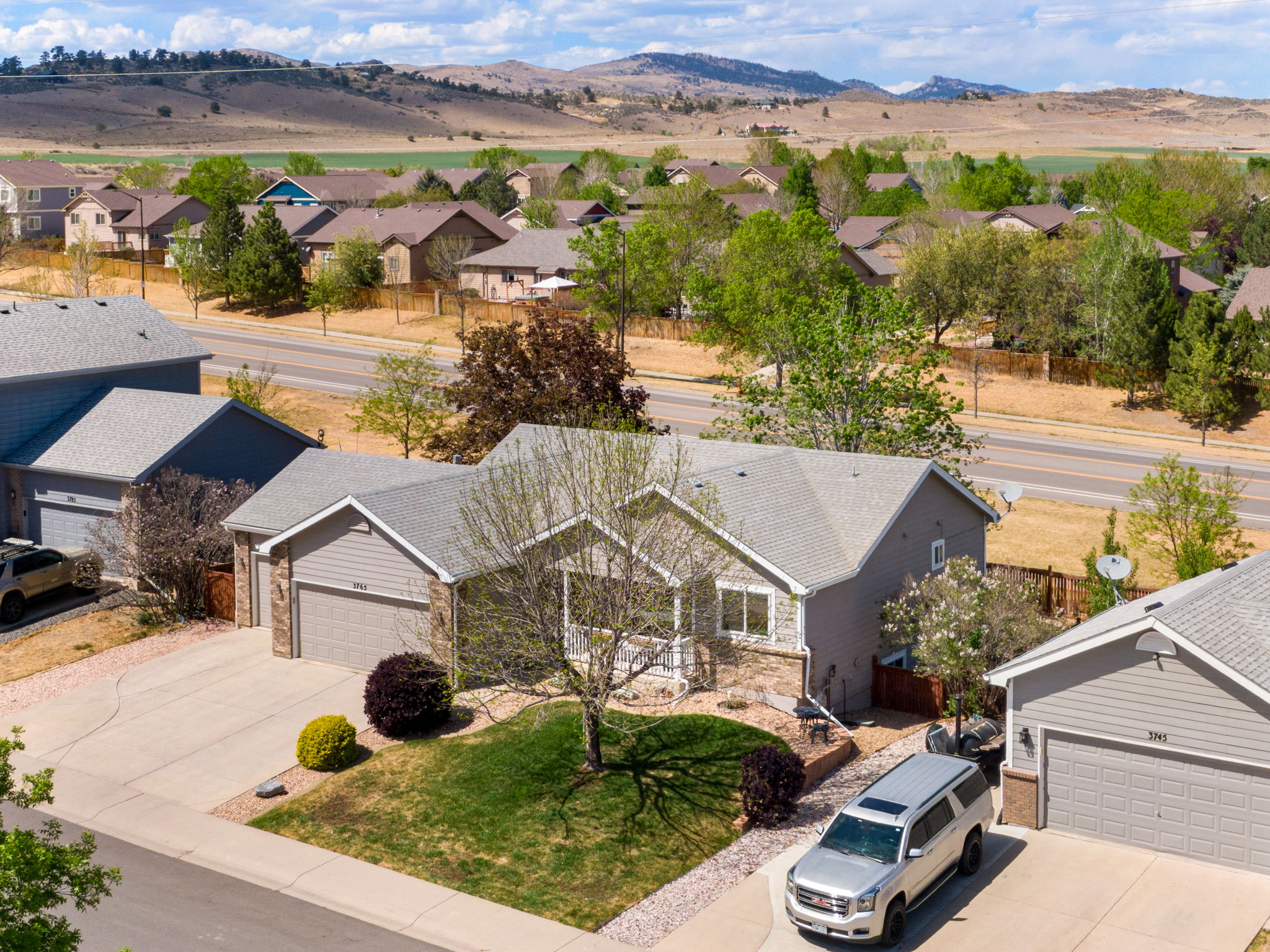 STUNNING RANCH STYLE HOME WITH 3 CAR GARAGE