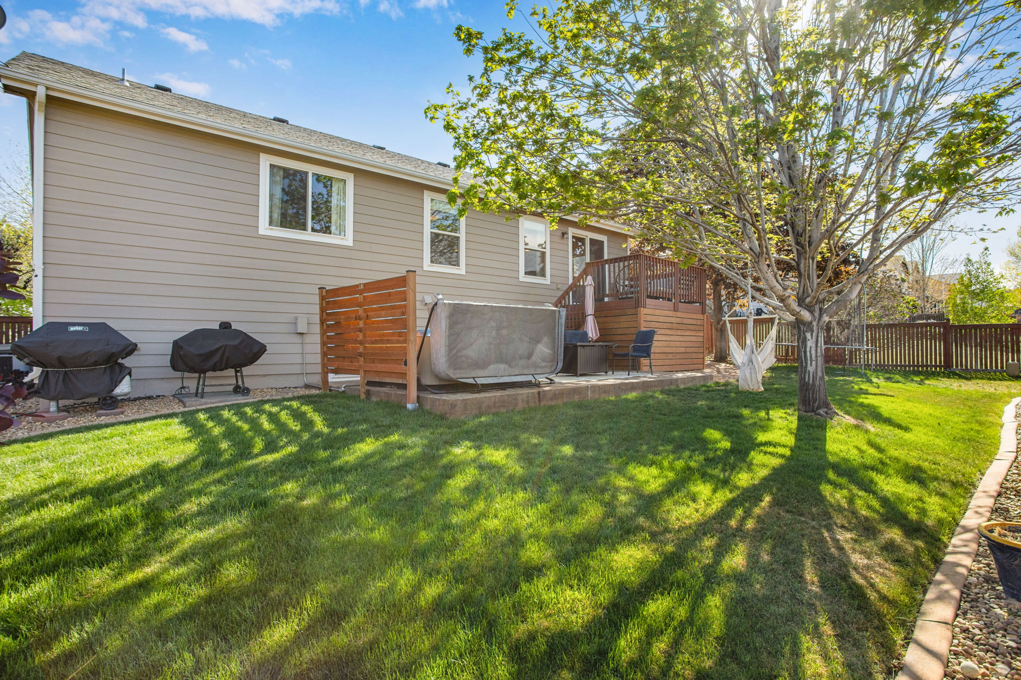 CAN YOU SEE YOURSELF ENJOYING THIS PRIVATE BACK YARD?
