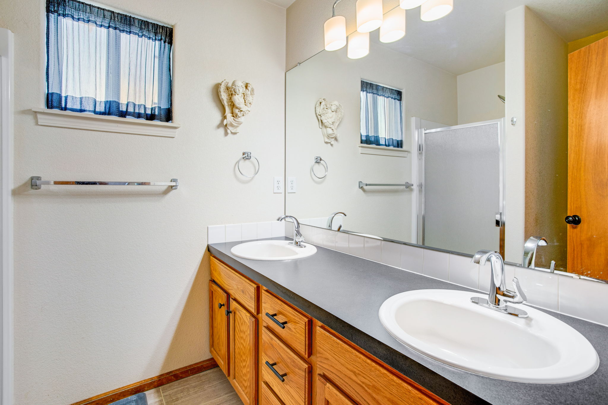 6' VANITY WITH DOUBLE SINKS AND 3/4 BATH WITH ONE PIECE STALL SHOWER SURROUND