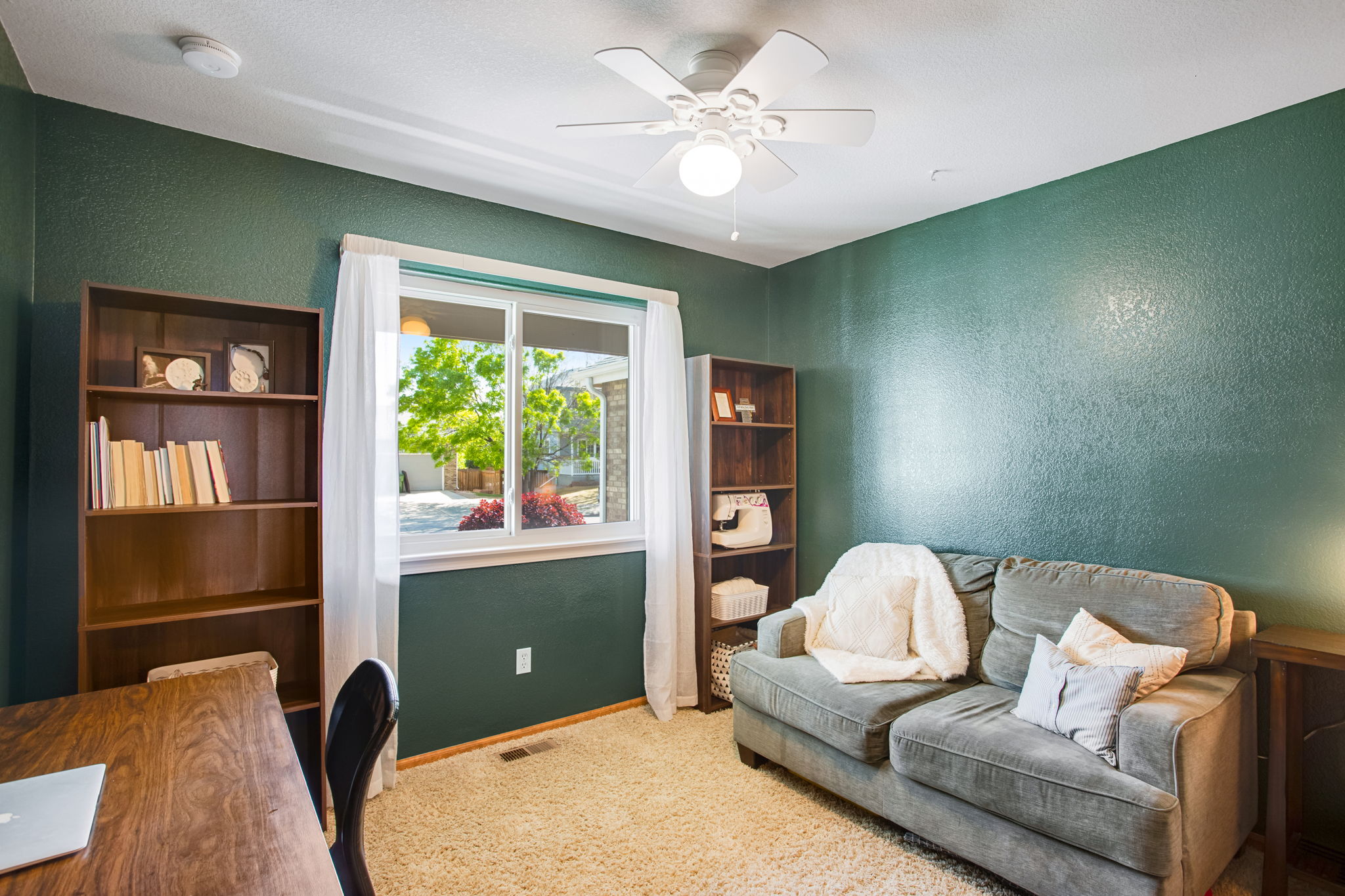 BEDROOM #2 WITH LARGE WINDOW LOOKING TO FRONT YARD