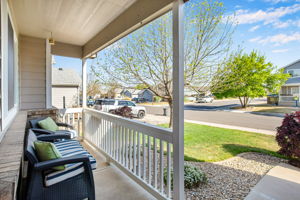 INVITING FRONT PORCH TO RELAX ON