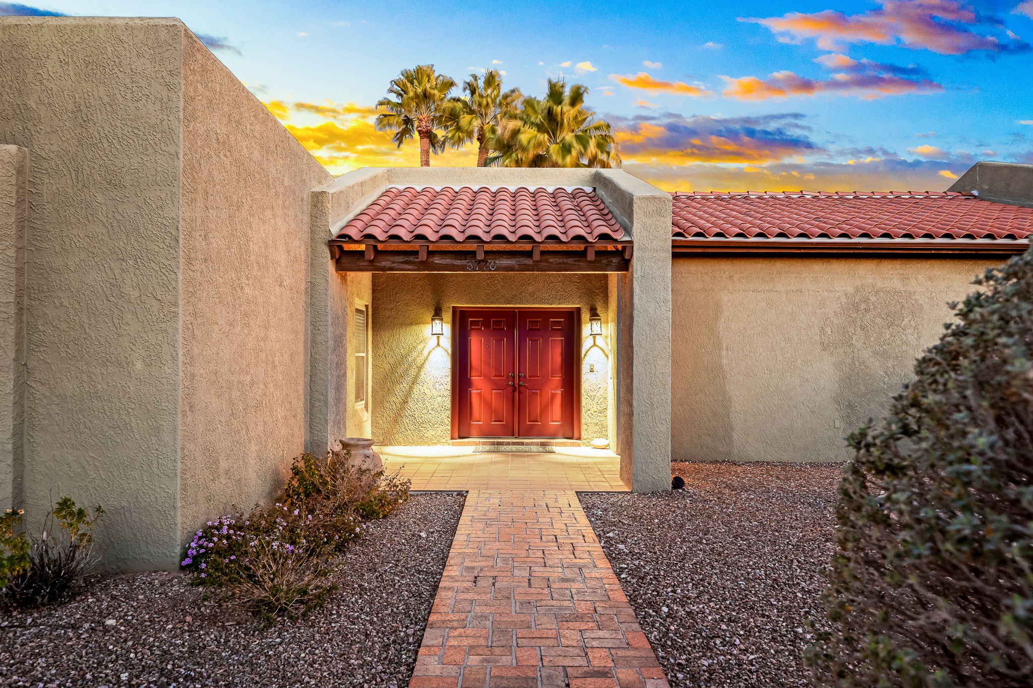 Covered front porch with double door entry