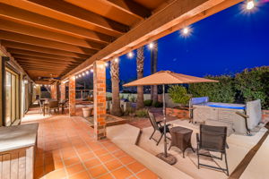 Covered patio off primary bedroom/ Hot Tub