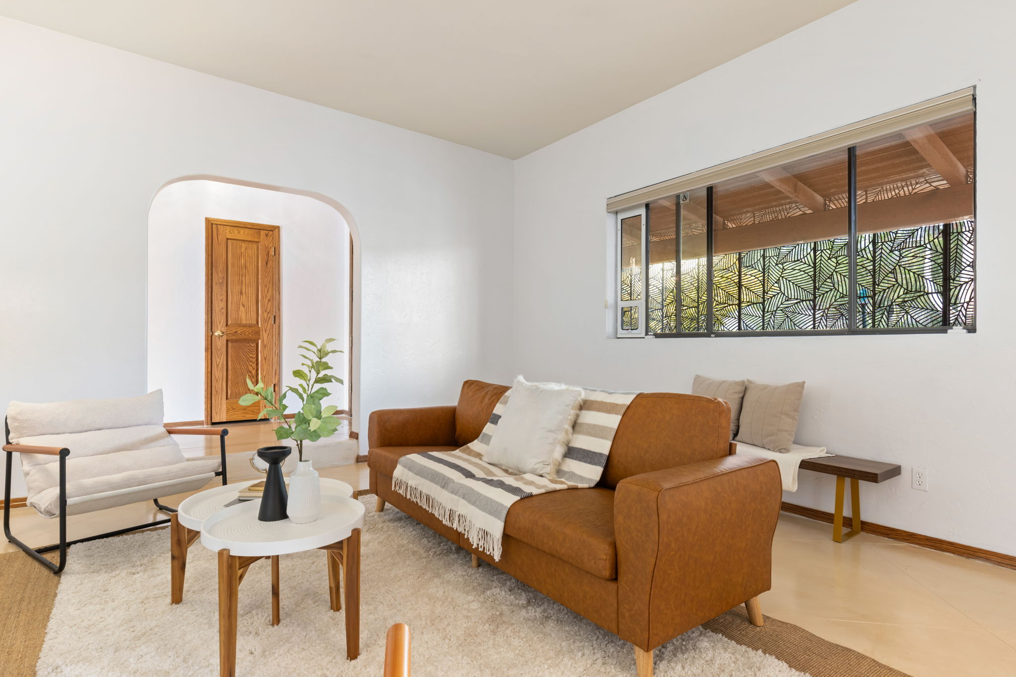 Living Room/ Picture window to courtyard entry