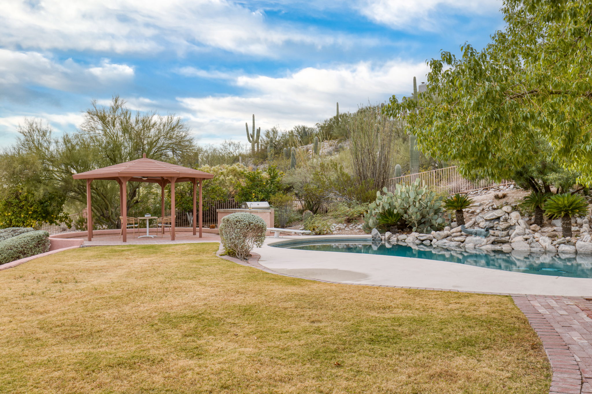 Pool and Gazebo. Hillside with desert landscaping