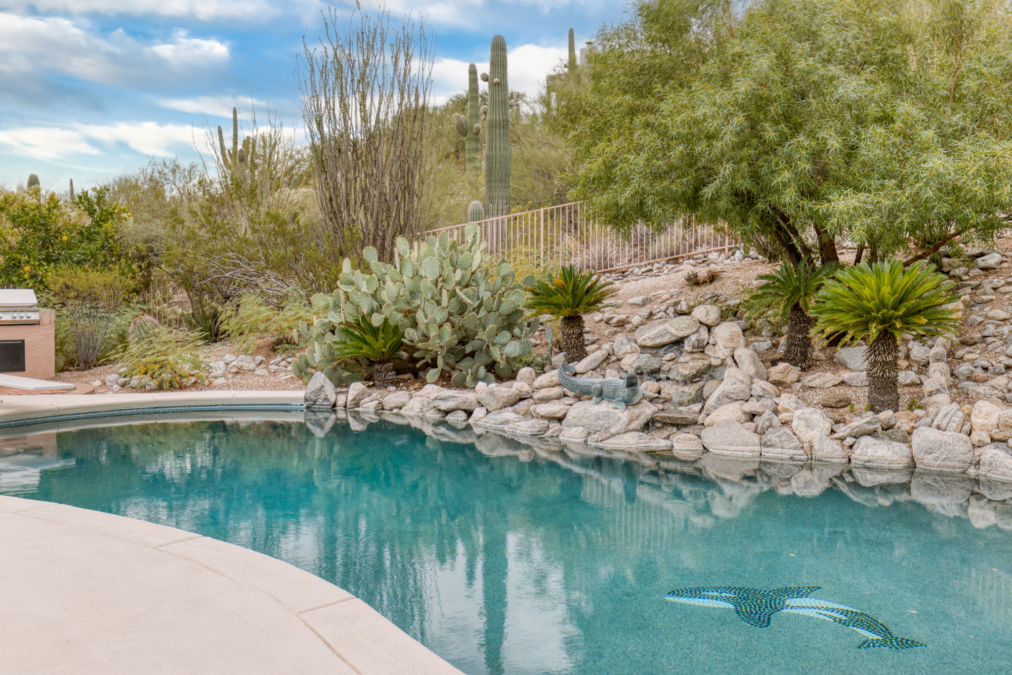 Pebble tea pool with waterfall