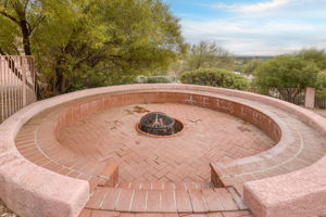 Paver fire pit area with built-in seating