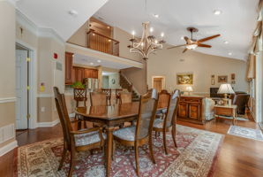 Great Room A soaring ceiling enhances the open and airy great room, where beautiful hardwood floors and recessed lighting define the living and dining areas.